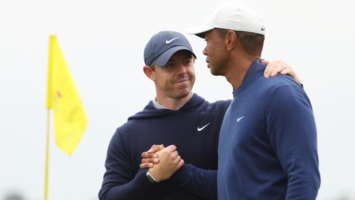 Rory McIlroy and Tiger Woods, the creators of the new TGL simulator golf league, shake hands at Augusta